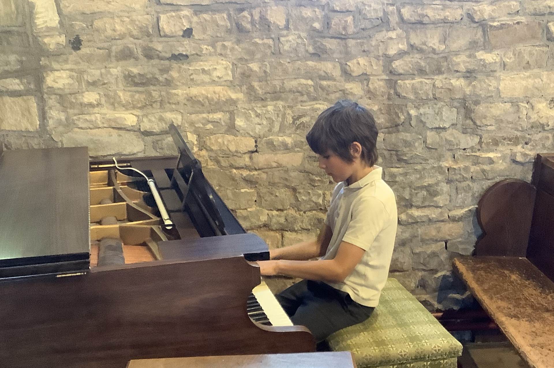child playing piano